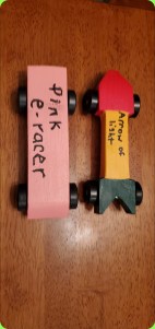 Pink e-racer and Arrow of light